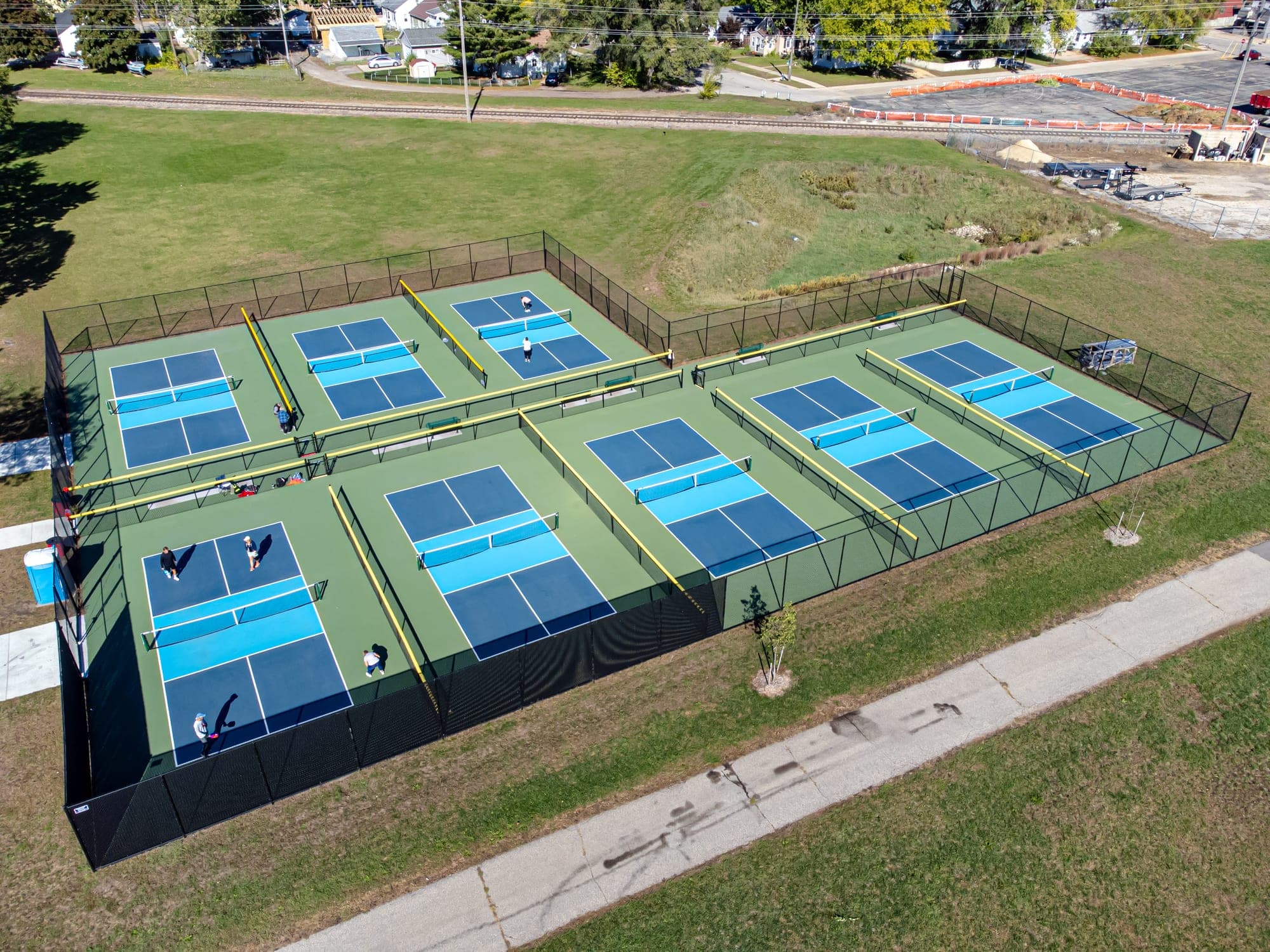 Aerial view of the pickleball courts and open grounds at All Abilities Trane Park