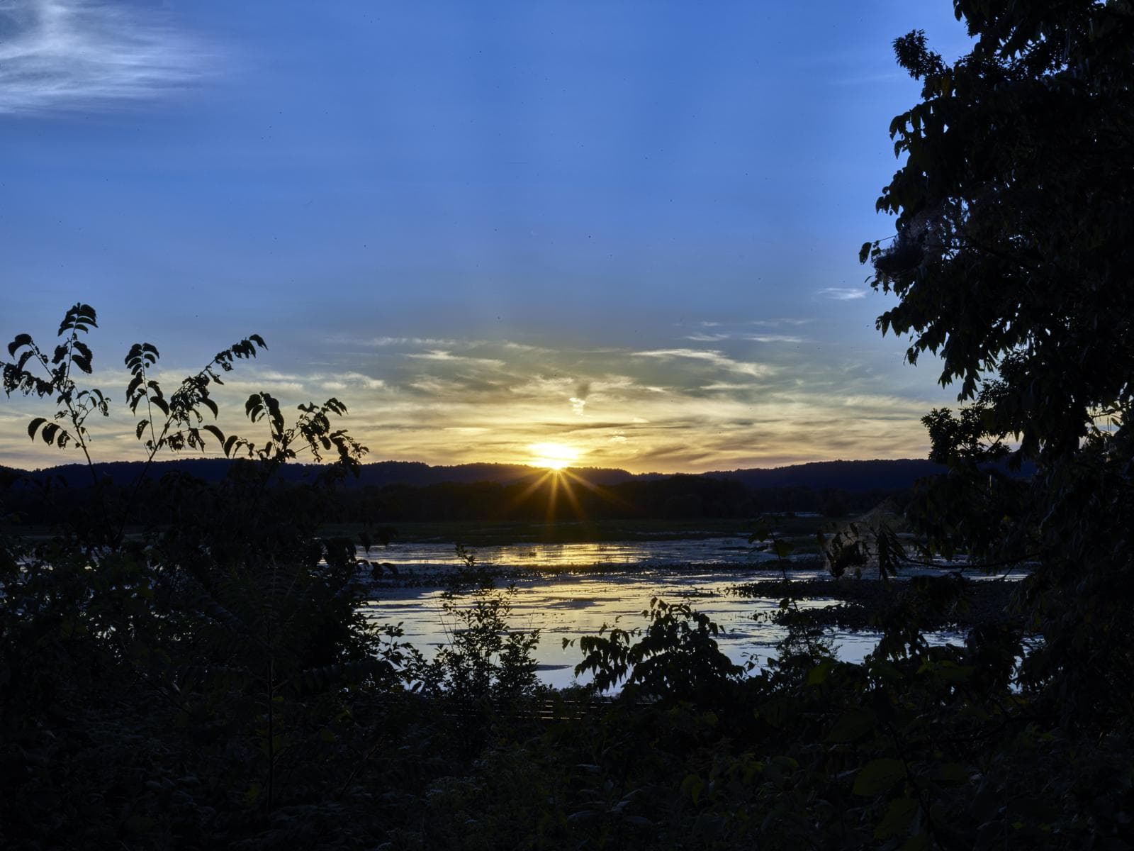 Sunset over the Mississippi River backwaters at Goose Island