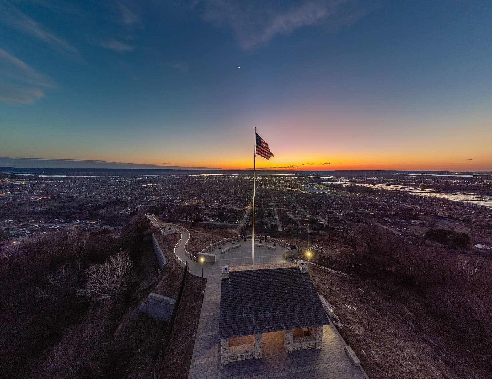 Grandad Bluff overlook and stone shelter above La Crosse at sunset