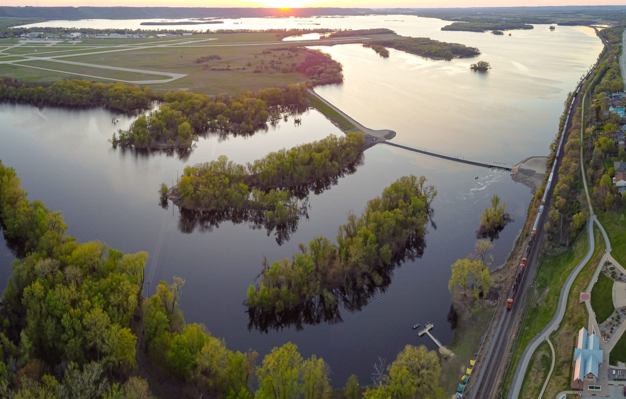 Aerial view of Great River Landing beside Lake Onalaska at sunset
