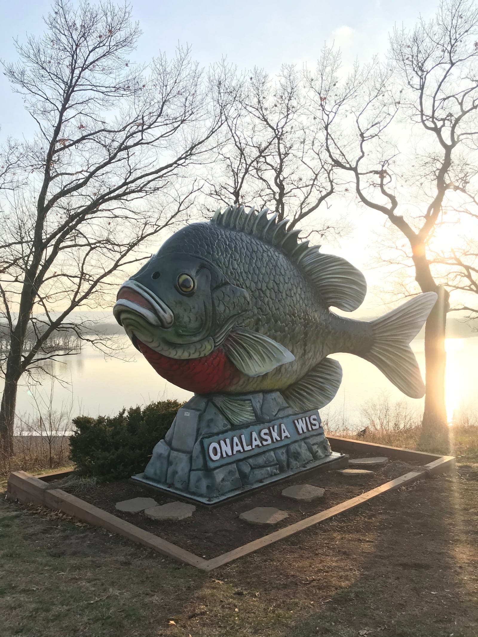 Sunny the Sunfish sculpture beside Lake Onalaska in the early evening